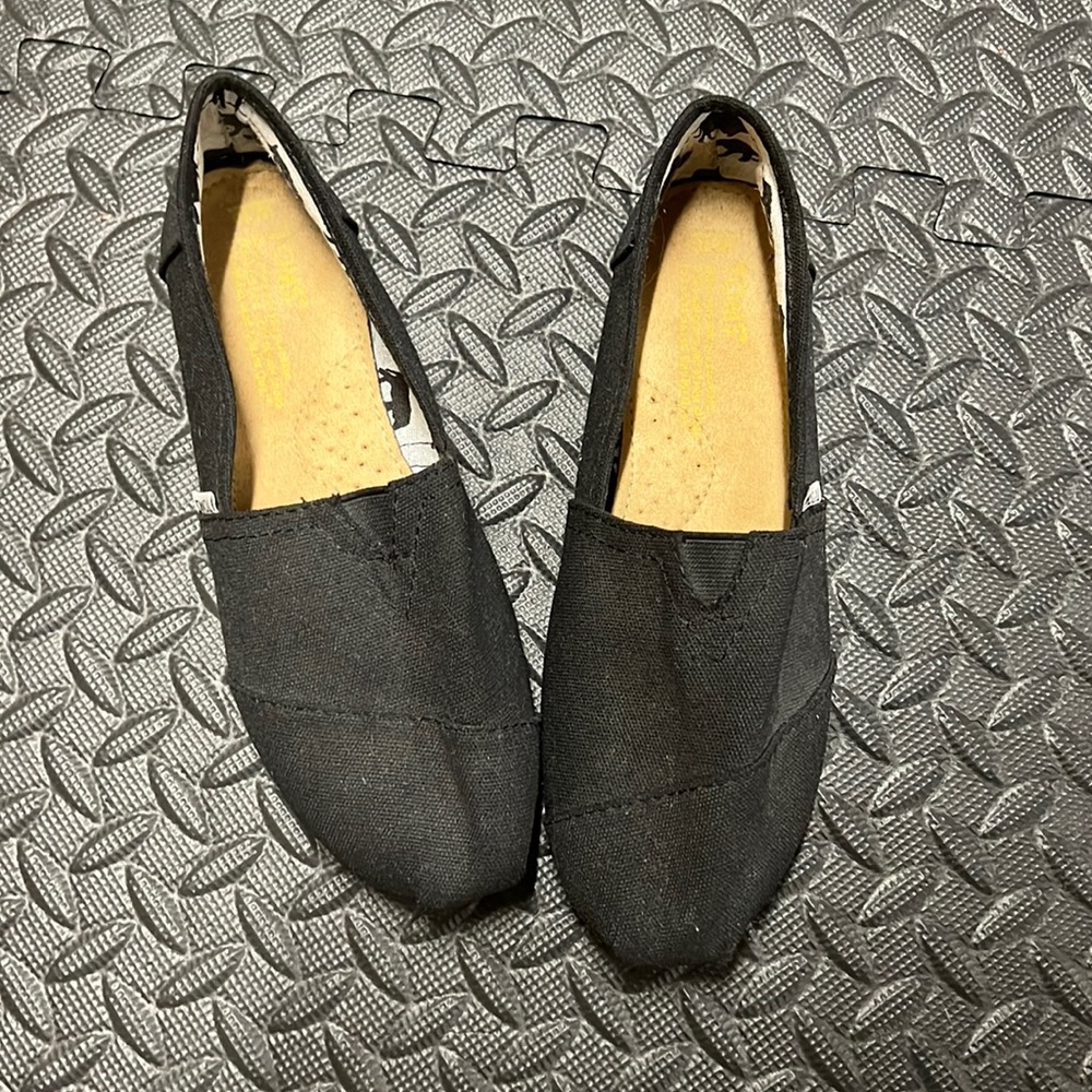 Black Toms flats